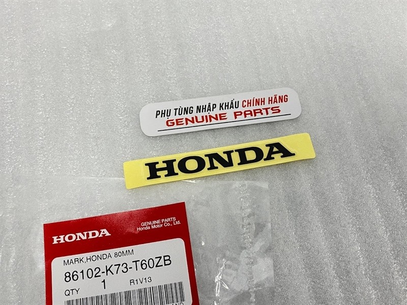 Tem Honda yếm trắng Wave 125i 86102-K73-T60ZB